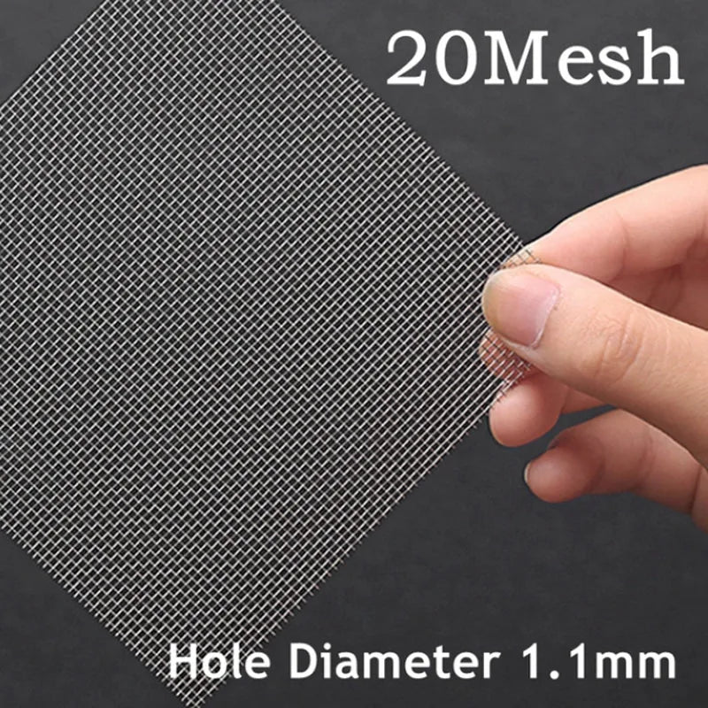 20 mesh screen with a hand holding it against a dark background