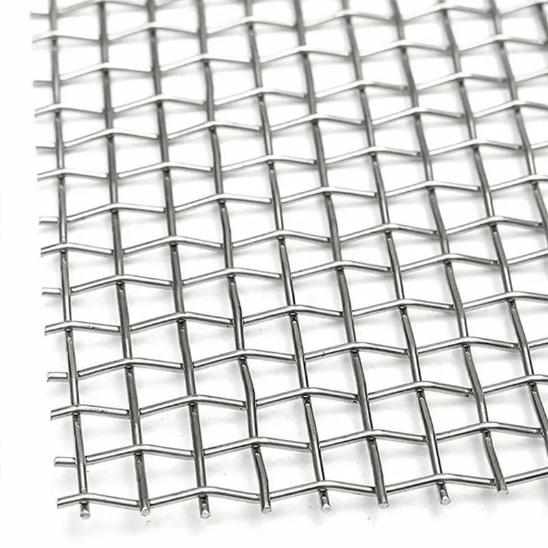 Metallic wire mesh on a white background