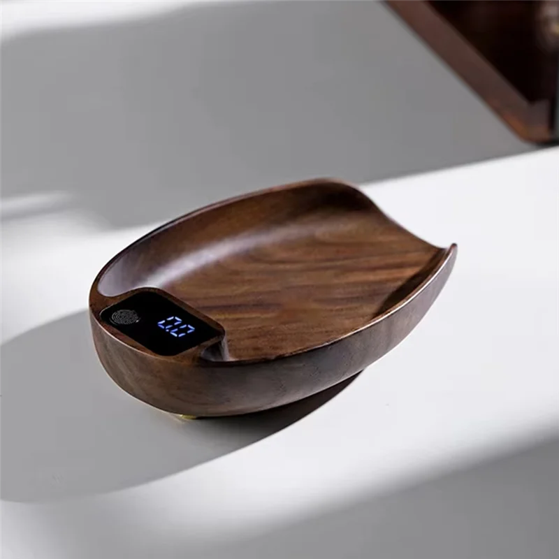 Wooden digital scale on a white surface