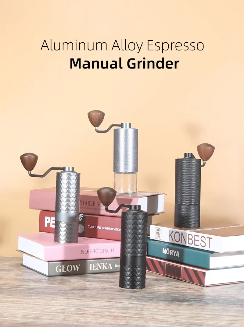 Aluminum Alloy Espresso Manual Grinder on a stack of books with a beige background