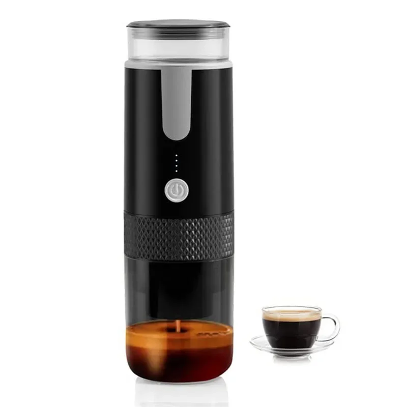 Black portable coffee maker with a cup of coffee on a white background