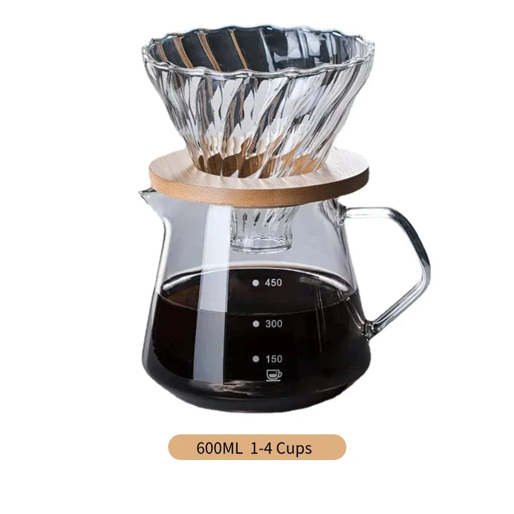 Clear glass coffee maker with wooden lid on a white background