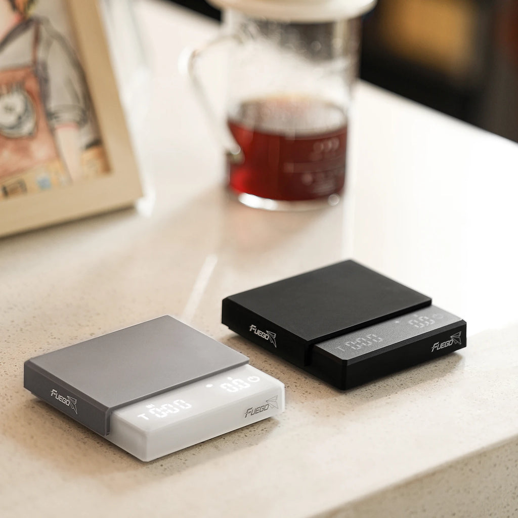 Two electronic devices labeled 'Fuzion' on a surface with a blurred background